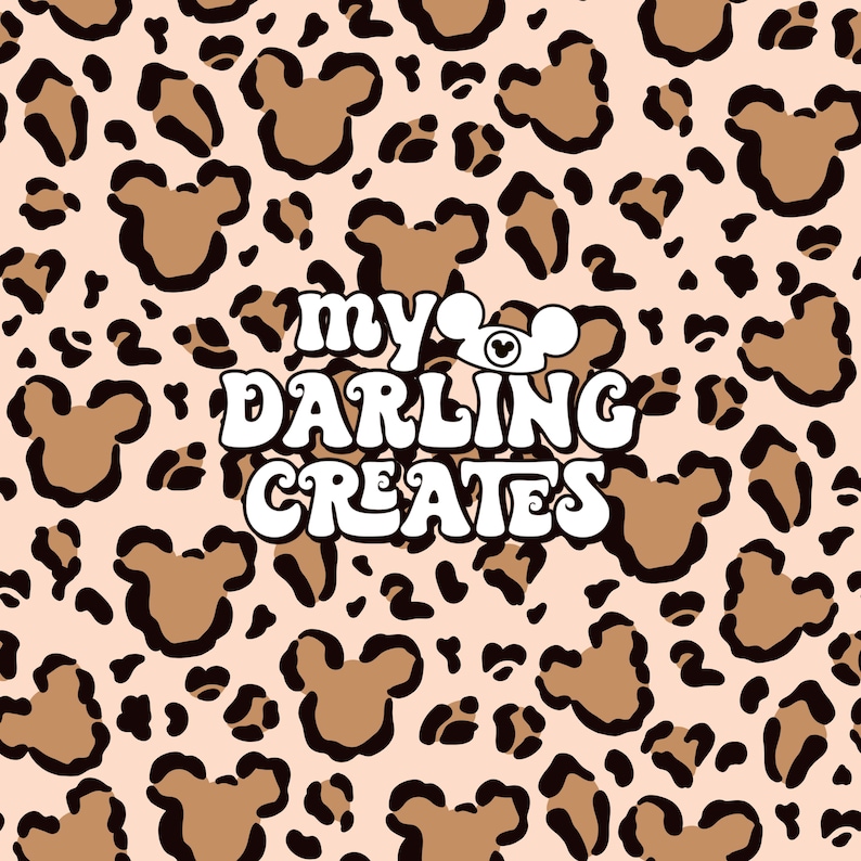 May include: A pink background with a brown and black leopard print pattern. The text "my darling creates" is in white letters with a brown Mickey Mouse head with a red hat above the word "my".