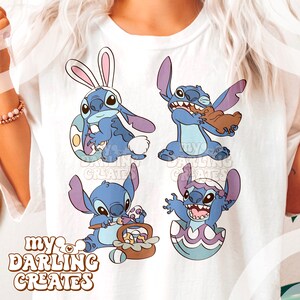 May include: A white t-shirt with a blue cartoon character, Stitch, in four different poses. Stitch is wearing bunny ears, holding an Easter egg, eating a chocolate bunny, and holding a basket of Easter eggs. The text "my darling creates" is printed on the bottom left of the shirt.