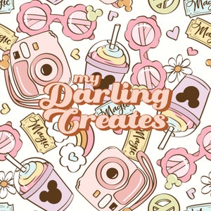 May include: A seamless pattern featuring a pink and white camera, sunglasses, Mickey Mouse ears, rainbow, and a pink and white cup with a Mickey Mouse ear on the side. The text "my Darling Creates" is in the centre of the pattern.