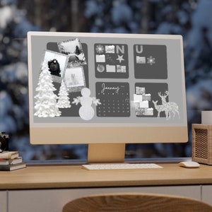 May include: A computer monitor with a white background and a calendar for January. The calendar has a white snowflake design and the word "January" written in black. There are also several other white images on the screen, including a snowman, a deer, and a tree.