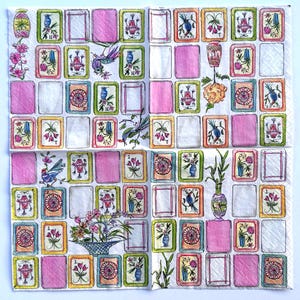 May include: A decorative paper napkin with a repeating pattern of framed illustrations and pink squares. The illustrations feature birds, flowers, and vases in a variety of colors, including pink, green, and blue. The napkin is white with a textured surface.