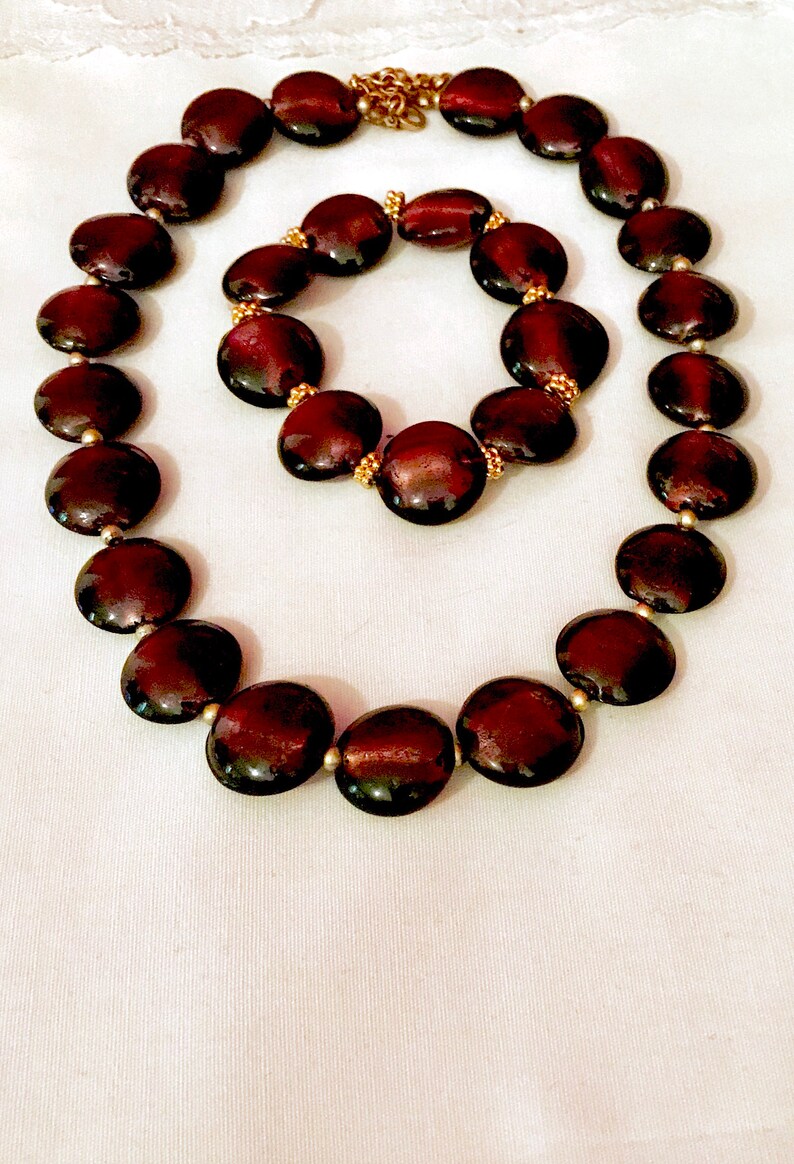 The wave of mid century in all its charms See Purple lovers unite in enjoying this beautiful vintage carbochon with see through stones
