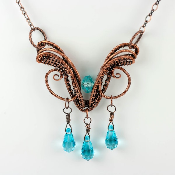 Turquoise Crystal Drops Accent an Intricately Wire Wrapped Choker Style Pendant Necklace with Antiqued Copper Wire