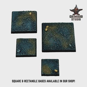 May include: Four square and rectangular bases with textured surfaces in shades of blue, brown, and tan. The bases are of varying sizes. The text "SQUARE & RECTANGLE BASES AVAILABLE IN OUR SHOP!" is at the bottom, with the Grimrod Studio logo in the upper right.