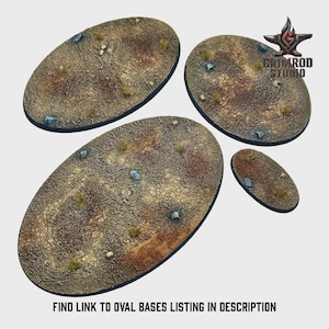 May include: Four oval bases with a textured, desert-like appearance. The bases are primarily brown with patches of green and small rocks. The text "FIND LINK TO OVAL BASES LISTING IN DESCRIPTION" is at the bottom.