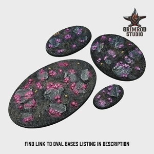 May include: Four oval-shaped miniature bases with a textured, dark surface. The bases feature pink and purple clusters, gray rock-like elements, and small yellow details. The text "FIND LINK TO OVAL BASES LISTING IN DESCRIPTION" is at the bottom.