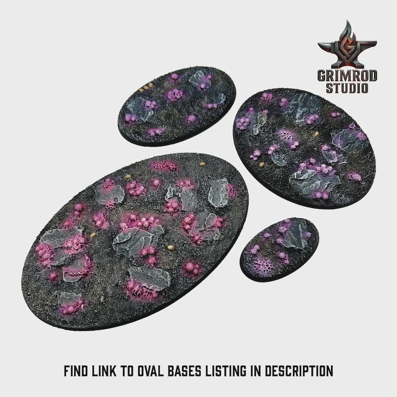 May include: Four oval-shaped miniature bases with a textured, dark surface. The bases feature pink and purple clusters, gray rock-like elements, and small yellow details. The text "FIND LINK TO OVAL BASES LISTING IN DESCRIPTION" is at the bottom.