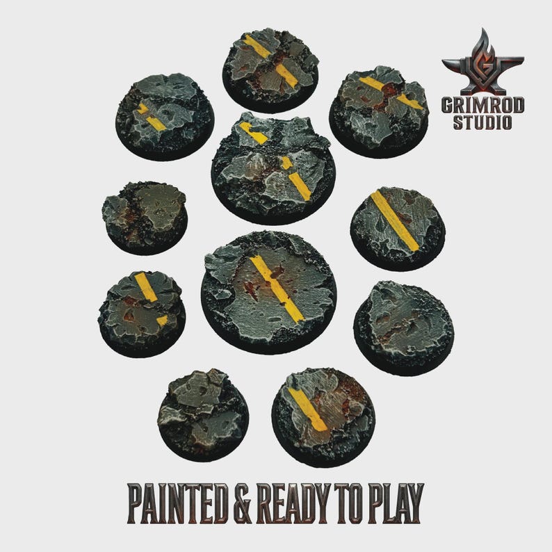May include: A collection of eleven miniature bases, painted to resemble sections of asphalt road. Each base is gray with yellow road markings and textured to simulate cracks and wear. The text "PAINTED & READY TO PLAY" is at the bottom.