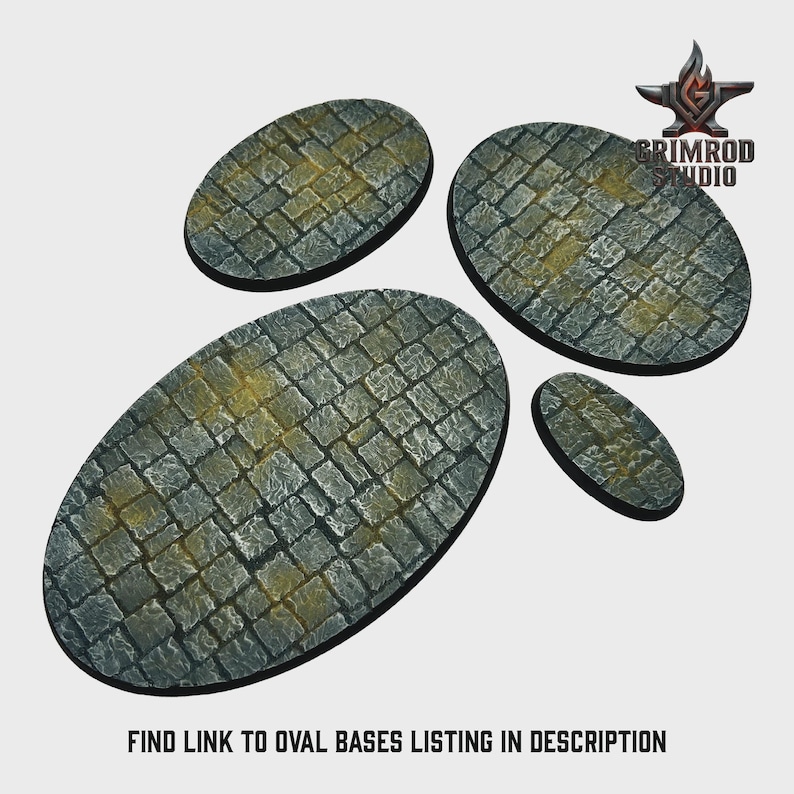 May include: Four oval-shaped bases with a cobblestone texture, in varying sizes. The bases are primarily gray with yellow and brown accents, suggesting an aged appearance. The Grimrod Studio logo is in the top right corner. Text at the bottom reads: FIND LINK TO OVAL BASES LISTING IN DESCRIPTION.