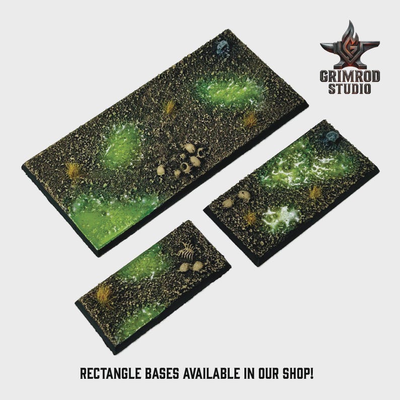 May include: Three rectangular bases with a textured, dark brown surface, featuring patches of green and yellow vegetation, and small bone-like details. The bases are of varying sizes. The text "RECTANGLE BASES AVAILABLE IN OUR SHOP!" is at the bottom.