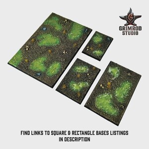 May include: A set of four miniature bases with a textured, earthy appearance. The bases feature patches of vibrant green, resembling foliage, set against a dark brown backdrop. The text "FIND LINKS TO SQUARE & RECTANGLE BASES LISTINGS IN DESCRIPTION" is visible.