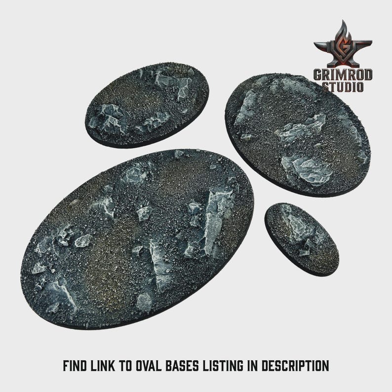 May include: Four oval-shaped miniature bases with textured surfaces, ideal for tabletop gaming. The bases are primarily dark gray with lighter gray and white accents, resembling a rocky terrain. The image includes the text: "FIND LINK TO OVAL BASES LISTING IN DESCRIPTION."