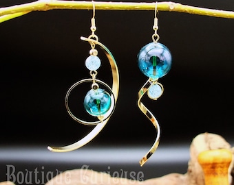 Asymmetrical Comet earrings in blown glass