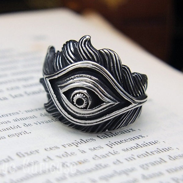 Bague oeil plume de paon acier