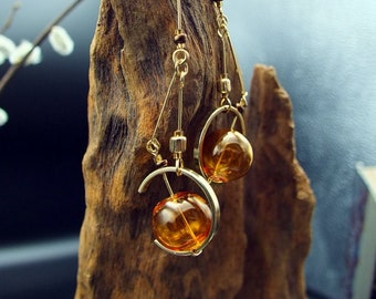 Steampunk sextant blown glass earrings