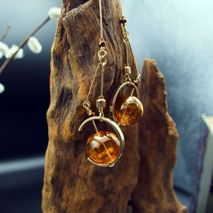Boucles d'oreilles steampunk sextant verre soufflé