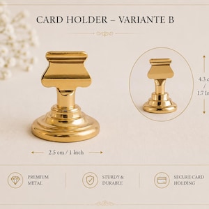 Puede incluir: Un tarjetero de metal dorado etiquetado como CARD HOLDER - VARIANTE B. La base mide 2,5 cm de di&aacute;metro y la altura es de 4,3 cm. El dise&ntilde;o presenta una base circular con un clip superior ensanchado para sujetar tarjetas de forma segura.