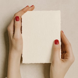 Pack of 10 handmade deckle-edged papers in Ivory– available in various sizes.