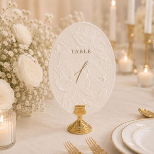 Oval Wedding Table Number with Floral 3D Blind Embossing on Handmade Deckle-Edge Paper in 6 Colors – Elegant Wedding Table Décor