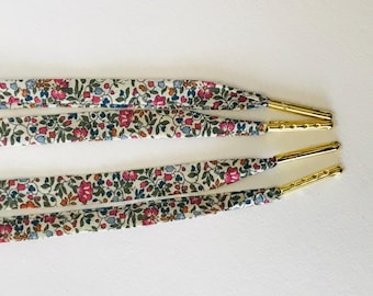 Pair of Liberty Bistre Fabric Shoelaces by Katie and Millie / Choice of ends: Gold ends / Silver ends / Transparent ends