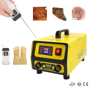 May include: A yellow Lavat Smart welding machine with a digital display showing readings. Includes a remote control, safety gloves, and a handle. The machine has a red power button and two connection ports.