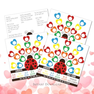 A printable Lovebug dice game with a ladybug design. The game features colorful heart shapes in red, yellow, blue, green, and orange. Instructions and a dice game chart are included, with text indicating the colors and numbers for each roll. The words 'Instant Download' are at the bottom.