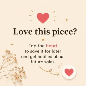 May include: A cream-colored graphic with a red heart icon and the text Love this piece? Tap the heart to save it for later and get notified about future sales. A small sprig of dried white flowers is visible in the lower left corner of the image.