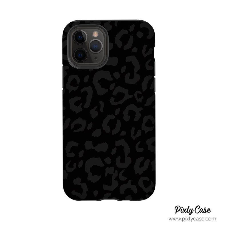 May include: Black phone case with a leopard print design.