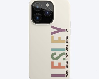 May include: A white phone case with a colourful name "LESLEY" printed on it. The letters are outlined with a leopard print pattern.