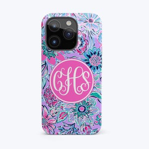 May include: A purple and pink floral phone case with a pink circle containing the monogram "CHS" in white.