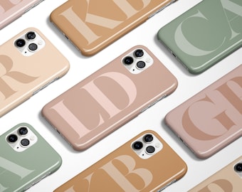 May include: Nine different phone cases with a single letter printed on each. The cases are in various colors, including beige, brown, green, and pink. The letters are in a bold, serif font.