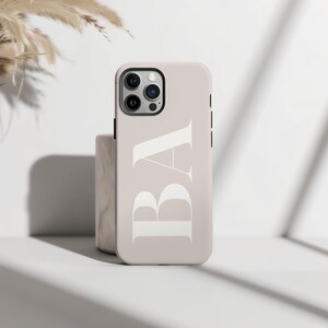 a phone case sitting on top of a rock
