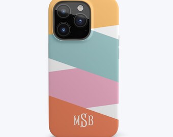 May include: A phone case with a geometric design in shades of orange, pink, blue, and white. The case has a monogram "MSB" in white on the bottom.
