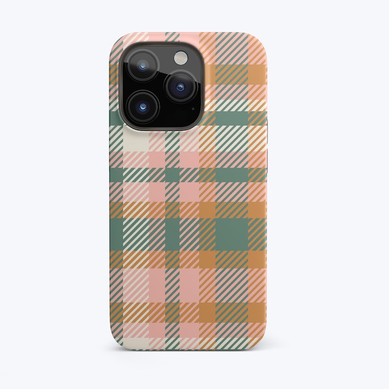 May include: A phone case with a plaid pattern in shades of pink, green, and orange. The case has a cutout for the camera lens.