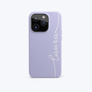 May include: A lavender phone case with a white script font that reads "laura" vertically along the right side. The case has a camera cutout and buttons on the side.