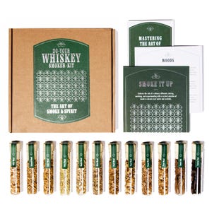 May include: A brown box with the text "Do-Your Whiskey Smoker Kit" and "The Art of Smoke & Spirit". The box contains 12 glass tubes filled with different types of wood chips. There are also three cards with the text "Mastering the Art of Woods", "Smoke It Up", and "Woods".