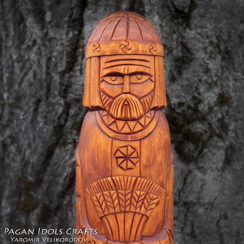 Yarilo is a carved wooden statue of a figure the Slavic god | Etsy
