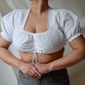 Vintage Dirndl Blouse: White Cotton Blend Folk Crop Top with Lace Trim (Size L)