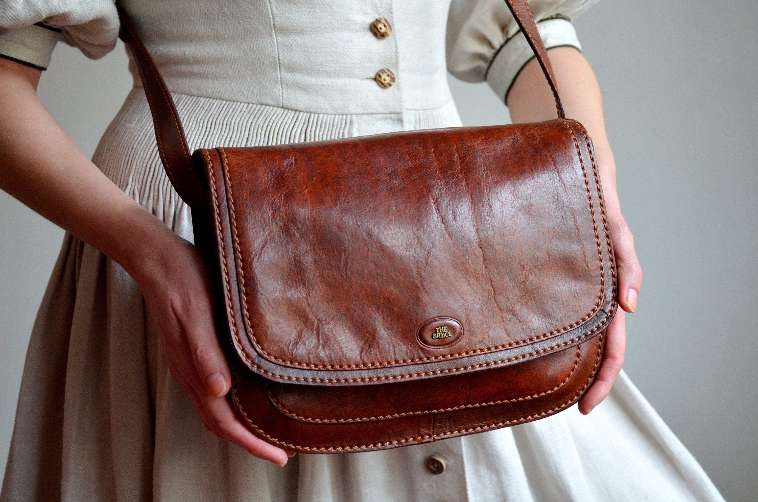 Vintage 90s The Bridge Crossbody Bag, Cognac Brown Messenger Bag, Genuine Leather Purse, Italian Designer Bag, Boho Hipster Flap Bag Vintage 90s The Bridge Crossbody Bag, Cognac Brown Messenger Bag, Genuine Leather Purse, Italian Designer Bag, Boho Hipster Flap Bag