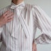 see more listings in the Blouses & Tops section