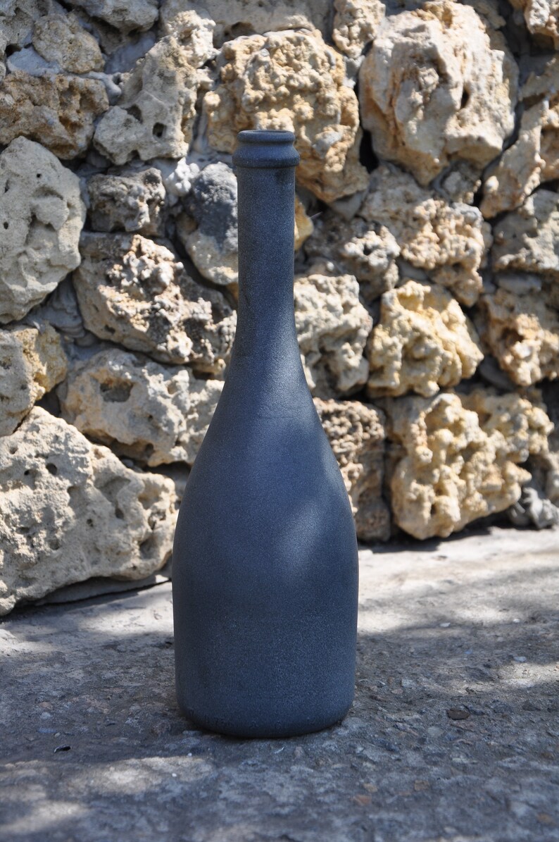 Old sea glass bottle. Absolutely whole. Etsy