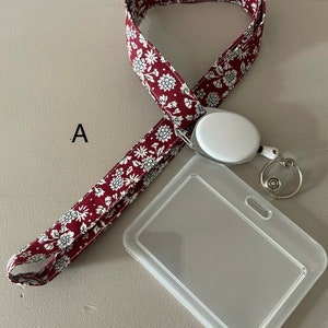 Neck strap/expandable badge holder