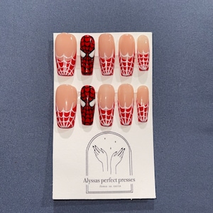 Spiderman red French tip spiderweb nails