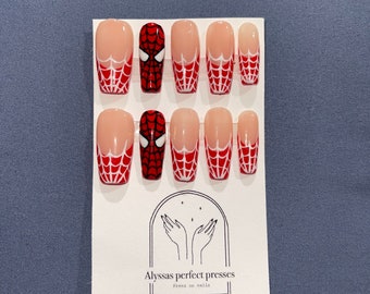 Spiderman red French tip spiderweb nails