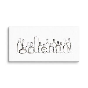 May include: A white canvas print with a minimalist line drawing of bottles. The black ink outlines depict various bottle shapes and sizes. The artwork is mounted on a white background, creating a simple and elegant aesthetic.