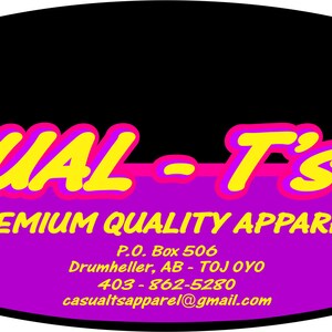 May include: An oval logo with a black top and purple bottom, featuring the yellow text CASUAL-T'S and PREMIUM QUALITY APPAREL. Below is the address P.O. Box 506, Drumheller, AB - T0J 0Y0, phone 403-862-5280, and email casualtsapparel@gmail.com. A white shirt icon.