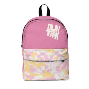 May include: Pink backpack with a camouflage pattern on the bottom half and the words "DUN TALK" in white on the top half.