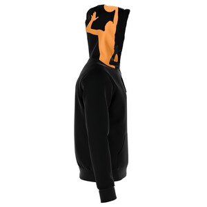 May include: Black hooded sweatshirt with a zipper closure. The hood has a graphic print of an orange silhouette of a person playing basketball.