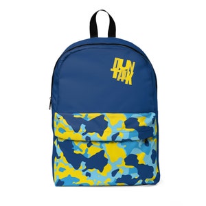 May include: Blue backpack with a yellow camouflage pattern on the bottom half and the text "DUN TAK" in yellow on the top half.