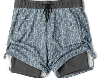 Puede incluir: Shorts deportivos azules y grises con un patrón repetido de las palabras "Don't" y "Ball". Los shorts tienen un forro incorporado.